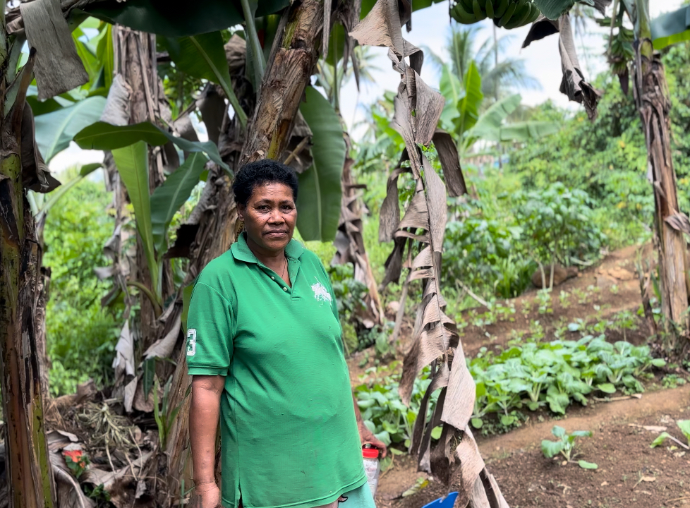 Asenaca at her backyard garden - her main farm is located about 20 minutes away from her home.